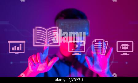 Immersive Learning. Mature student in virtual reality headset. Stock Photo
