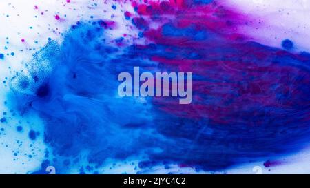 paint splatter colorful background blue pink spots Stock Photo