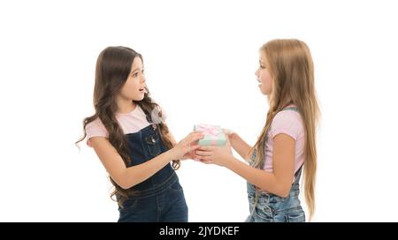 Delivery and handling. Adorable little girls fighting for present box. Gift shop with delivery service. Fast gift delivery is sure to please. Perfect Stock Photo