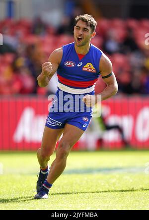 Ben Cavarra of the Bulldogs reacts after kicking a goal during the Round 12  AFL match between the Western Bulldogs and Adelaide Crows at Metricon  Stadium on the Gold Coast, Sunday, August