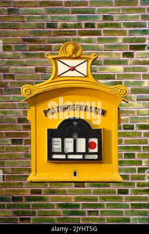 Old letter box on an old brick wall, Germany Stock Photo