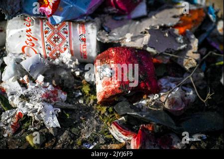 MALA TOKMACHKA, UKRAINE - SEPTEMBER 7, 2022 - Blood covers the remains of humanitarian cargo after the shelling of Russian troops, Mala Tokmachka vill Stock Photo