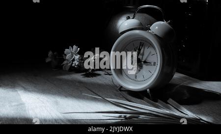 black and white photo of an alaram clock Stock Photo