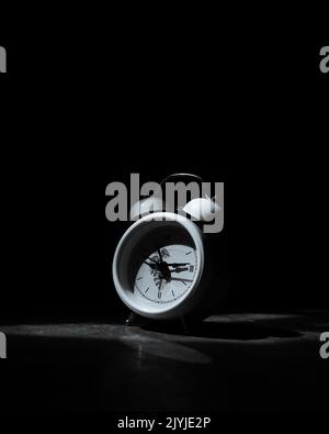 black and white photo of an alaram clock Stock Photo