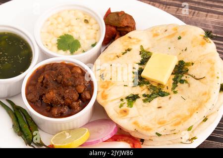 Chole Kulche Also Called Matar Kulcha, Chhole Kulche Is Widely Popular Delhi Street Food. The Dish Comprises Of Mildly Leavened Soft Fluffy Flatbread Stock Photo