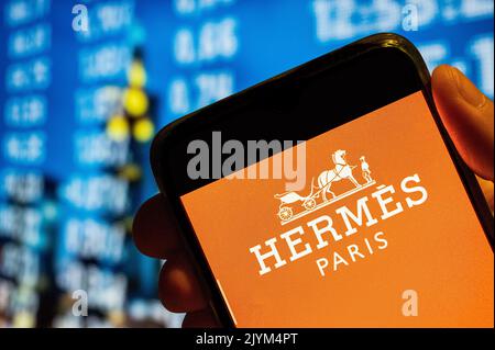 China. 25th July, 2022. In this photo illustration, the French high fashion luxury clothing manufacturer Hermes logo is displayed on a smartphone screen. (Photo by Budrul Chukrut/SOPA Images/Sipa USA) Credit: Sipa USA/Alamy Live News Stock Photo