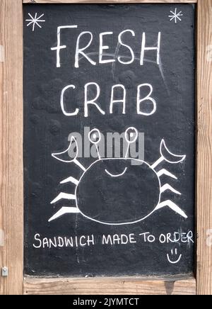 Totnes, South Devon, UK. 25th July, 2022. A sign for fresh crab sandwiches in Totnes. Credit: Maureen McLean/Alamy Stock Photo