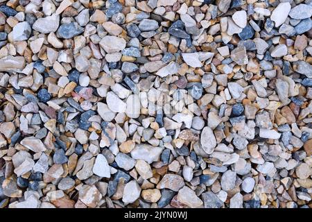 Texture of natural rubble. Stones, crushed stone building material. Top view. Stock Photo