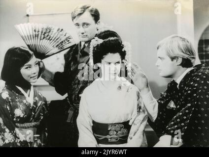 Actors Robert Vaughn, David McCallum, Irene Tsu, and Kim Darby in the movie The Karate Killers, USA 1967 Stock Photo