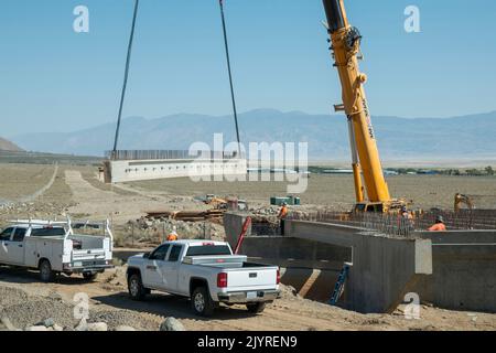 This road project near Olancha in Inyo County, CA, USA is building a brand new highway and bridge using heavy machinery. Stock Photo