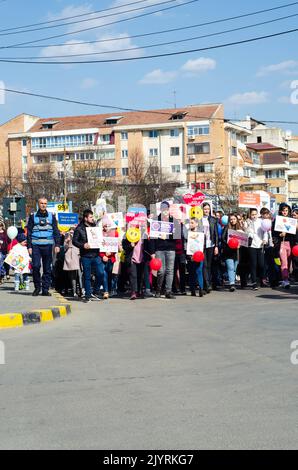Botosani, Romania - March 26, 2022: Young people take part in the 'March for Life',  a rally organized in order to protect the right to life of unborn Stock Photo