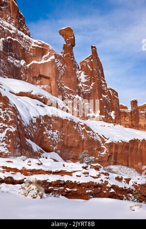 Nefertiti Rock or Queen Nefertiti on the west wall of Park Avenue in Arches National Park after a snowfall.  Moab, Utah. Stock Photo