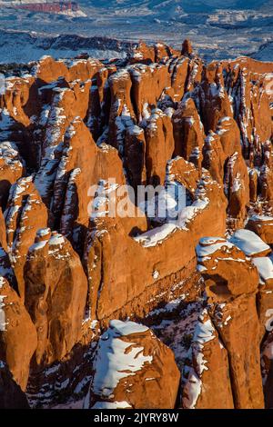 Snow-capped Entrada sandstone fins in the Fiery Furnace in winter.  Arches National Park, Moab, Utah. Stock Photo