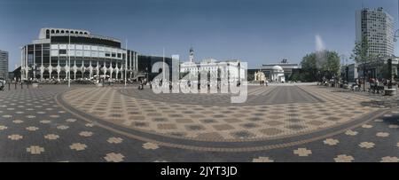 A panoramic lens view Centenary Square and the Reportary Theatre Birmingham June 1993. On the right is Alpha Tower and far middle distance is the Hall of Memory designed by S N Cooke and W N Twist as a memorial for the First World War 1914-18. made in Portland stone. To the right of it is Baskerville House once used as the Birmingham Council Offices. Stock Photo