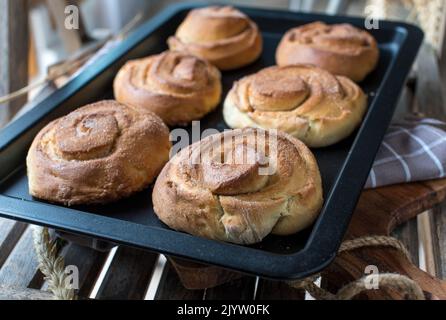 Homemade baked cinnamon rolls. Traditional swedish kanelbullar Stock Photo