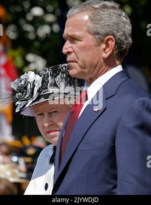 Washington, DC. 7th May, 2007. WASHINGTON - MAY 07: (AFP OUT) U.S. President George W. Bush (R) and HRH Queen Elizabeth II review the troops on the South Lawn of the White House May 7, 2007 in Washington, DC. The queen and her husband, Prince Philip, the Duke of Edinburgh are on a six-day trip to the U.S. (Photo by Mark Wilson/Getty Images) *** Local Caption *** George W. Bush Credit: dpa/Alamy Live News Stock Photo