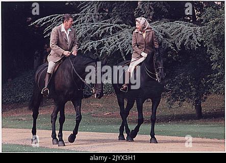 London, England - June 8, 1982 -- United States President Ronald Reagan and HRH Queen Elizabeth II horseback riding at Windsor Castle, England. Credit: The White House via CNP Stock Photo