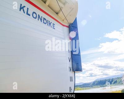 Whitehorse Yukon Territory - August 3 2008; Lens flare across bow of SS Klondike with scenic background Stock Photo