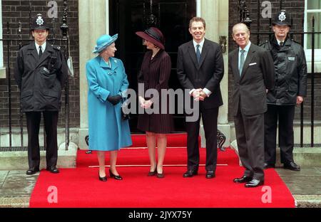 File photo dated 20/11/1997 of Queen Elizabeth II (left) and the Duke of Edinburgh (right) with Cherie Blair and Prime Minister Tony Blair during the royal 50th wedding anniversary walkabout in Downing St, London. The Queen died peacefully at Balmoral this afternoon, Buckingham Palace has announced. Issue date: Thursday September 8, 2022. Stock Photo