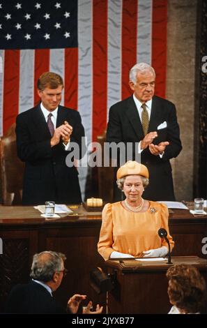 **FILE PHOTO** Queen Elizabeth II Has Passed Away. Queen Elizabeth II of Great Britain addresses a Joint Session of the United States Congress in the US House Chamber in the US Capitol during a State Visit on May 16, 1991. Seated in the rear are US Vice President Dan Quayle, left and Speaker of the United States House of Representatives Tom Foley (Democrat of Washington), right. Credit: Dennis Brack/Pool via CNP /MediaPunch Stock Photo