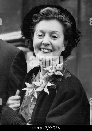 Winifred Shotter Marries -- Miss Winifred Shotter, the actress, and former wife of Brig. Green, secretary of the Worcestershire C.C.C., and manager of the last England team to tour Australia, leaving ***** Register Office today after her marriage to Gilbert Davis, the actor. January 14, 1952. Stock Photo