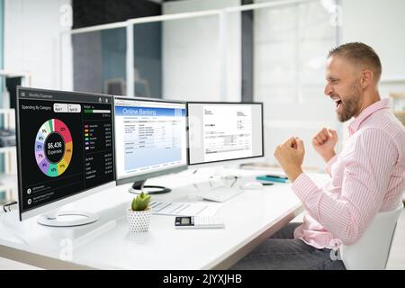 Excited Man With Online Budget Tracker. Celebrating Win Stock Photo