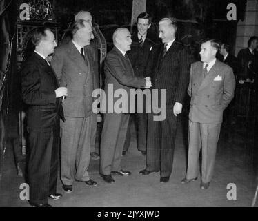 Negotiate Terms of union for Tenth Canadian Province A historic Meeting was held in the Senate chamber at Ottawa on October 6th between Newfoundland and Canadian Government delegations to open negotiation of precise terms of union between the two countries. Rt. Hon. L.S. St. Laurent, Acting Prime Minister of Canada, greets the Hon. A.J. Walsh and members of the Newfoundland delegation, at the historic meeting. Left to Right: Mr. J.R. Smallwood, Mr. F.G. Bradley, Mr. Philip Grouchy, Rt. Hon. L.S. St. Laurent, Mr. G.A. Winter, Hon. A.J. Walsh and Mr. J.B. McEvoy. November 24, 1948. (Photo by Nat Stock Photo