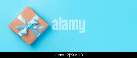 Gift boxes on a blue background. The concept of holidays. Stock Photo