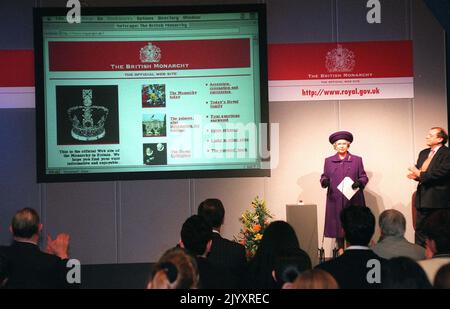 File photo dated 6/3/1997 of Queen Elizabeth II visiting Kingsbury High School, Brent, to launch the Royal website, the format of which can be seen on the large screen left. Issue date: Thursday September 8, 2022. Stock Photo