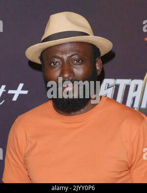 Babs Olusanmokun arrives at The Star Trek Celebration Red Carpet held ...