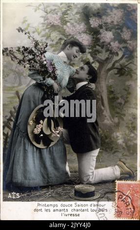 Vintage French postcard showing a photograph of a romantic couple Stock
