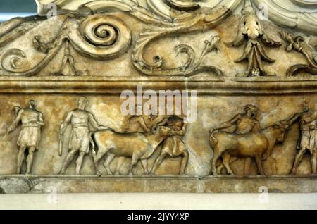 Sacrifice scene depicted in the Ara Pacis Augustae (Altar of Augustan Peace) commonly shortened to Ara Pacis, in Rome dedicated to Pax, the Roman goddess of Peace. The monument was commissioned by the Roman Senate on July 4, 13 BC to honor the return of Augustus to Rome after three years in Hispania and Gaul and consecrated on January 30, 9 BC. Originally located on the northern outskirts of Rome Stock Photo