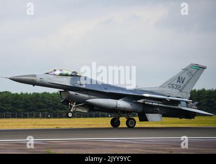 A U.S. Air Force F-16C Fighting Falcon assigned to the 555th Fighter Squadron from the 31st Fighter Wing, Aviano Air Base, Italy, lands at Royal Air Force Lakenheath, United Kingdom, Sep. 1, 2022, in preparation for the RAF’s Cobra Warrior 2022 exercise. The F-16C pilots conducted the training to familiarize themselves with the local area prior to CW22. The U.S. Air Force is engaged, postured, and ready with credible force to assure, deter and defend in an increasingly complex security environment. (U.S. Air Force photo by Tech. Sgt. Miquel Jordan) Stock Photo