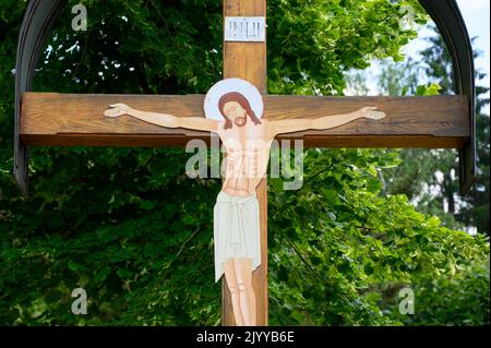 Byzantine crucifix near the Greek Catholic church of the Most Holy Eucharist in Vranov nad Topľou, Slovakia. Stock Photo