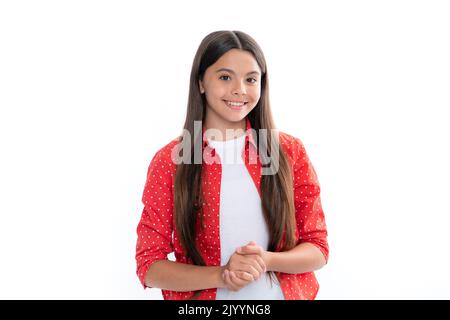 Portrait of happy smiling teenage child girl. Cute young teenager girl against a isolated background. Studio portrait of pretty beautiful child. Stock Photo