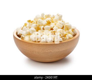 Popcorn in a wooden bowl placed on a white background. Stock Photo