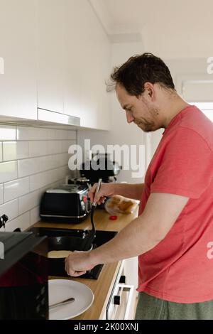 Nutritious handmade corn tortilla cooked on a metal griddle on a gas stove  in a Guatemalan home Stock Photo - Alamy