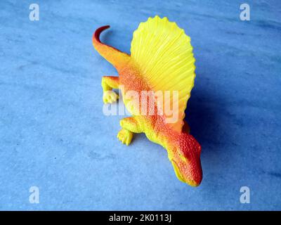 Tyrannosaurus dinosaurs toy isolated on stone  background with clipping path Stock Photo