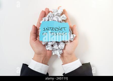 Sign displaying Internet Of Thingsconnection of Devices to the Net to Send Receive Data. Business overview connection of Devices to the Net to Send Stock Photo