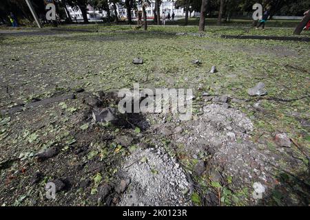 KHARKIV, UKRAINE - SEPTEMBER 08, 2022 - Aftermath of russian shelling with the Smerch multiple launch rocket system, Kharkiv, northestern Ukraine. Stock Photo