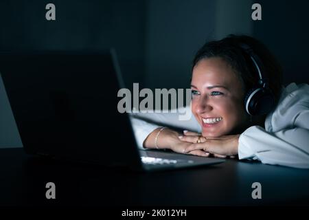 Watching Movie At Night. Broadband Internet Series Download. Stock Photo