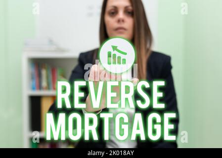 Text sign showing Reverse Mortgageloan for seniors age above sixties and older to be returned. Word Written on loan for seniors age above sixties and Stock Photo