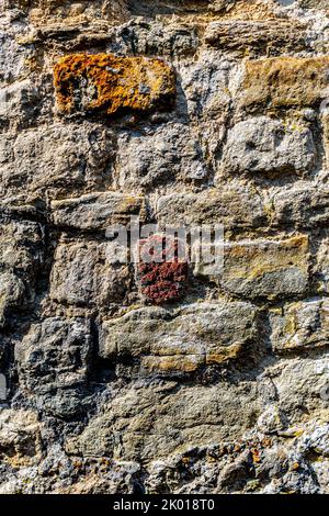 An old worn stone wall Stock Photo