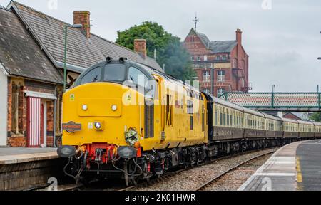 Newtown Powys, Wales, UK; Sept 9 2022: This is the cambrian coast express passing Newtown Powys on route to Pwllheli. The front engine dawning a wreath out of respect to the Queen that passed away the day before. Credit: H18PDW Photography/Alamy Live News Stock Photo