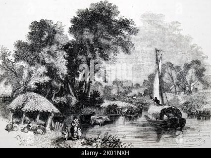 View on the River Bure on the Norfolk Broads showing a hay barge (wherry). Stock Photo