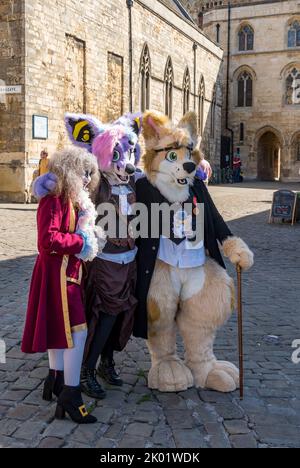 Three people in Steampunk costume, Lincoln Steampunk Festival, Castle Hill Lincoln 2022 Stock Photo