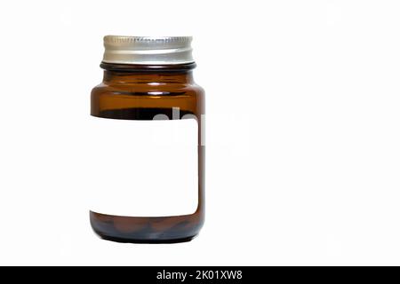Brown color medicine bottle. Medicine bottle with white text space on it. Blank label. Treatment idea concept. No people, nobody. Stock Photo