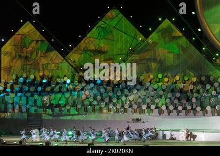 Dance show happening on the main stage during the opening ceremony of the World Nomad Games 2018 in Kyrgyzstan. Stock Photo