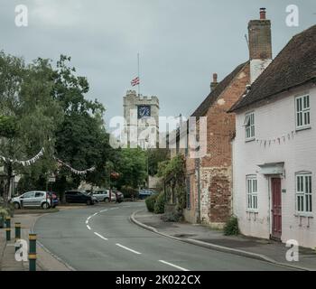 Fordingbridge, Hampshire, UK, 9th September 2022, a nation in mourning. A union jack flag flies at half mast over St Mary’s Church on Church Street the day after the death of Her Majesty Queen Elizabeth II. Paul Biggins/Alamy Live News Stock Photo