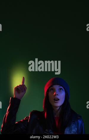 neon light portrait insight idea aha moment woman Stock Photo